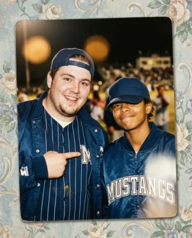 Baseball Stadium — Night Game, 1995 6 — Nano Banana AI Prompt: Two friends leaving the classic American ballpark — a young person with short da...