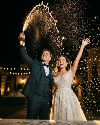 Luxury Champagne Celebration Wedding Campaign 4 — Nano Banana AI Prompt: The dark elegant background with subtle depth behind him. Flash-style frontal li...