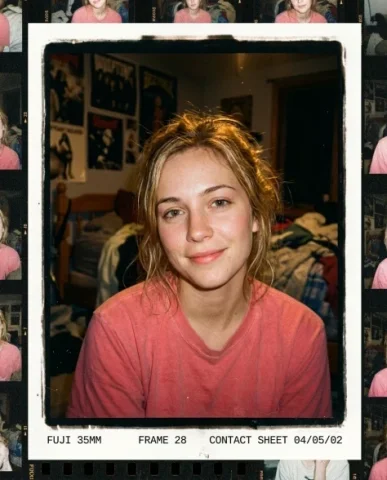Extreme Lo-Fi Webcam Contact Sheet — 48 Panels 7 — Nano Banana AI Prompt: The young woman with slightly messy honey-blonde hair looks directly at the came...