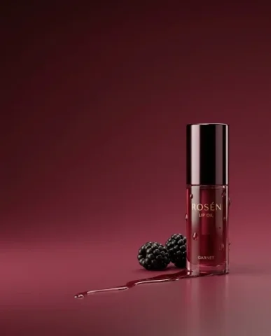 Luxury Lip Oil Beauty Product Photography 7 — Nano Banana AI Prompt: High-end beauty product photograph. The premium lip oil bottle tilts at a dramat...