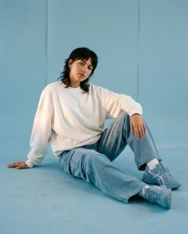 Minimalist Sky-Blue Streetwear Studio Portrait 7 — Nano Banana AI Prompt: Natural skin with realistic pores. Futuristic fashion editorial aesthetic. --ar...