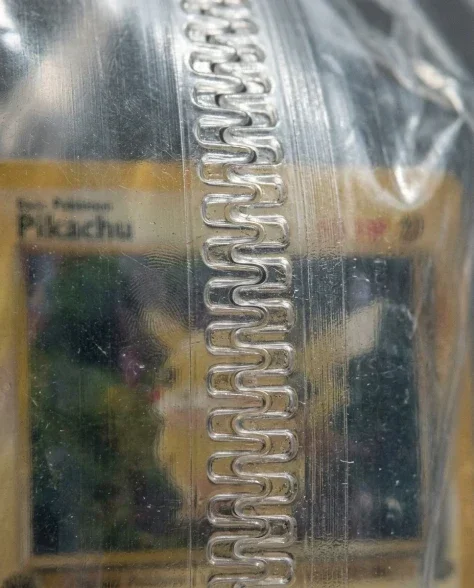 Collectible Card in Transparent Zip Bag Macro Shot 3