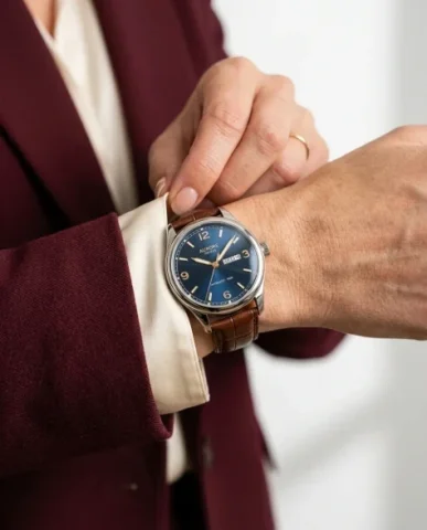 Low-Angle Fashion Campaign with Luxury Watch 4 — Nano Banana AI Prompt: Extreme close-up fashion product photograph of the luxury wristwatch filling the...