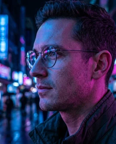 Neon-Lit Cyberpunk Portrait with Round Glasses 1 — Nano Banana AI Prompt: Facial details are rendered with extraordinary sharpness: natural skin texture w...