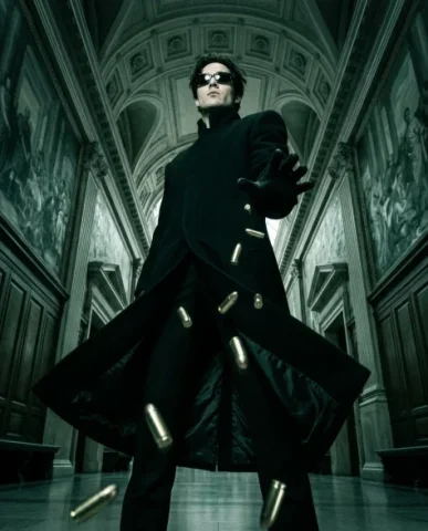 Cinematic Action Shot with Suspended Projectiles 4 — Nano Banana AI Prompt: The high-collared black long coat with structured shoulders billows slightly ope...