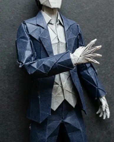 Origami Paper Craft Movie Poster Transformation 6 — Nano Banana AI Prompt: The figure is captured from chest to thigh in an action pose — one arm extended...