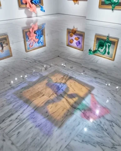 Surreal Modern Art Gallery with Paintings Becoming Reality 3 — Nano Banana AI Prompt: The reflections create abstract chromatic pools on the floor — coral pink and el...