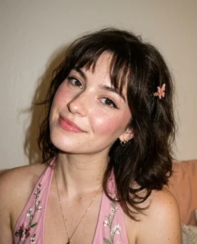 Soft Flash Coquette Portrait with Butterfly Clip 2 — Nano Banana AI Prompt: Her shoulders are slightly turned with her head tilted and one eye closed in a p...