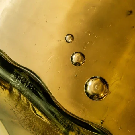 Air Bubbles in Amber Glass