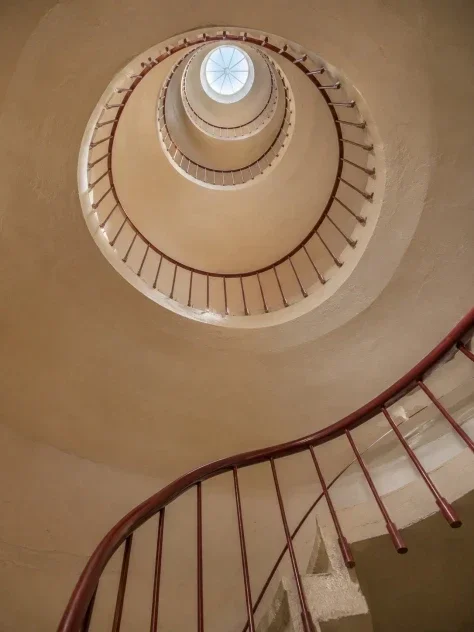 Oxblood Handrail Spiral Stairwell