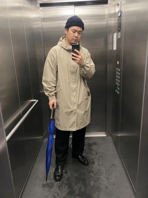 Blue Umbrella in the Elevator