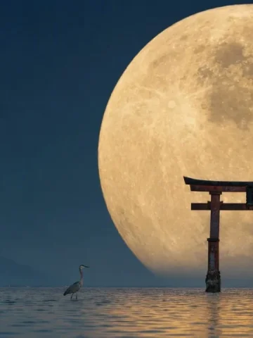 Giant Moon and Torii Telephoto — GPT Image 2.5 AI Prompt: Extreme telephoto view, 1200mm compression, an enormous full moon rising directl...
