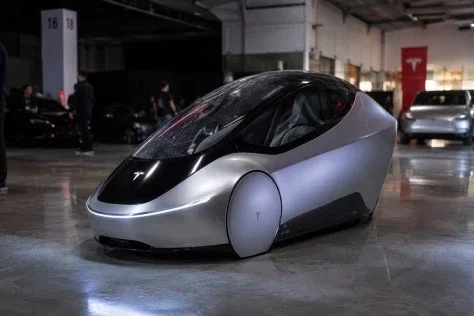 Single-Seat Autonomous Concept Car — Nano Banana 2 AI Prompt: Create a photorealistic prototype Tesla designed exclusively for single-occupanc...