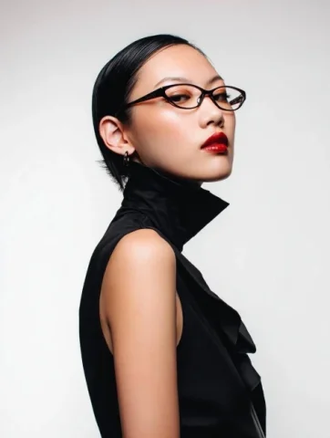 Avant-Garde Asian Fashion Model — Nano Banana 2 AI Prompt: upper body portrait of a high-fashion Asian female model wearing eyeglasses, ava...