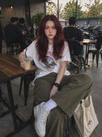 Smartphone Café Candid — GPT Image 2.5 AI Prompt: Use the reference photo as the primary facial identity. Preserve the face as clo...