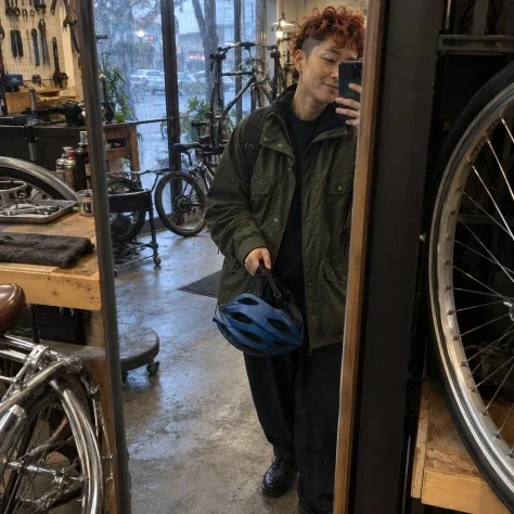 A Satisfied Selfie at the Bicycle Shop