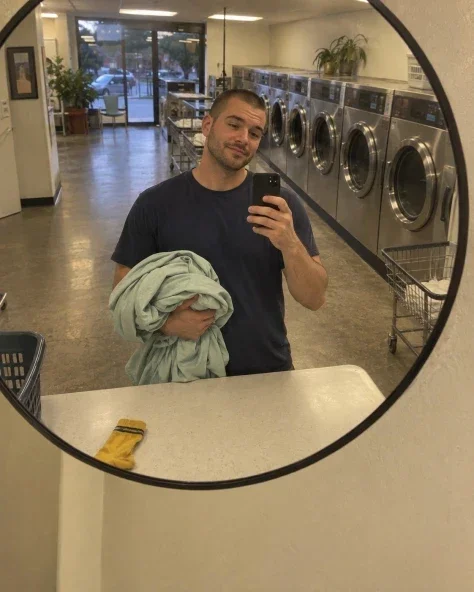 The Round Mirror in the Laundromat