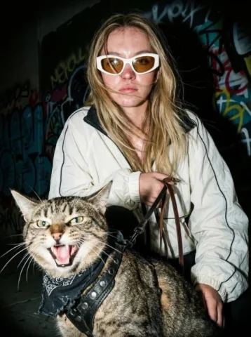 Flash Cat Street Fashion Editorial — Nano Banana 2 AI Prompt: { "image_prompt_data": { "subjects": { "human": { "appearance": "Young woman wit...