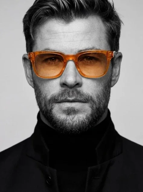 Black-and-White Male Headshot With Amber Glasses