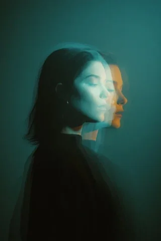 Double Exposure Side-Profile Portrait — Nano Banana 2 AI Prompt: Cinematic double exposure portrait of a woman in side profile, two overlapping f...