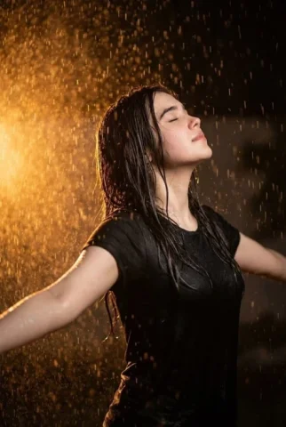 Night Rain Portrait with Orange Backlight — Nano Banana 2 AI Prompt: Ultra realistic cinematic portrait of a 32-year-old young woman standing in heav...