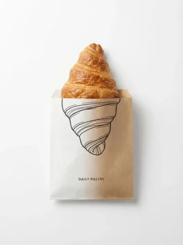 Minimal Packaging Food Line Continuation — Nano Banana 2 AI Prompt: minimal studio shot on pure white background, real [Food Name] emerging from a p...