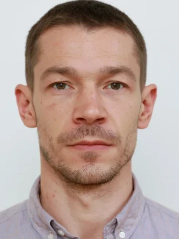 Introverted Man Plain ID Photo — Nano Banana 2 AI Prompt: 28-year-old thin man，Introverted, standard crew cut, average-looking, ID photo,...