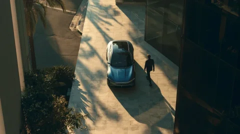 Top-Down Luxury Sedan at Golden Hour — Nano Banana 2 AI Prompt: Top down overhead shot, 80 degree high angle, futuristic luxury sedan centered o...