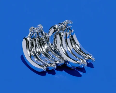 Platinum Bananas on Blue — Nano Banana 2 AI Prompt: a bunch of bananas that are made out of platinum separated out on blue backgroun...