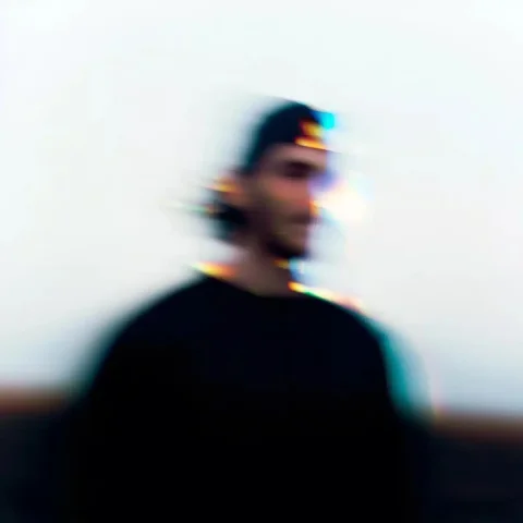 Motion Blur Male Headshot — Midjourney v6 AI Prompt: realistic headshot of male in early 30s, The person is looking to into the dista...