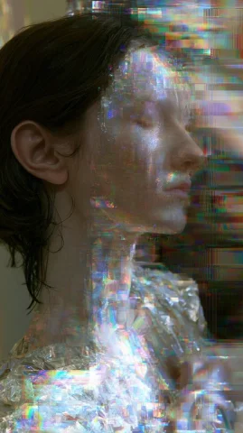 Digital Glitch Portrait — Nano Banana 2 AI Prompt: a portrait oriented shot of a women upper body with their left side facing the v...