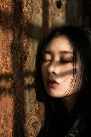 Candid Rust-Wall Close Portrait — Nano Banana 2 AI Prompt: A natural candid moment captured in authentic daily life photography, shot at ex...