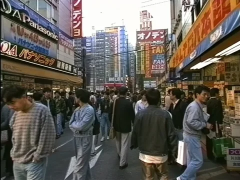 1990s Akihabara Street Photo — Nano Banana 2 AI Prompt: Create a photorealistic documentary street photograph of Akihabara, Tokyo in the...