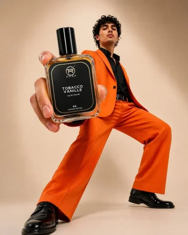 Perfume Fashion Mockup — Nano Banana 2 AI Prompt: Using the provided reference image as the product base, transform the simple per...