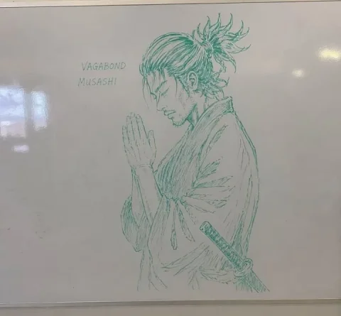 Samurai Sketch on Whiteboard — Nano Banana 2 AI Prompt: A realistic photograph of a whiteboard with a highly detailed green dry-erase ma...