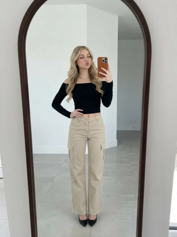 Arched Mirror Selfie Blonde Wavy Hair Cargo Pants Heels Portrait