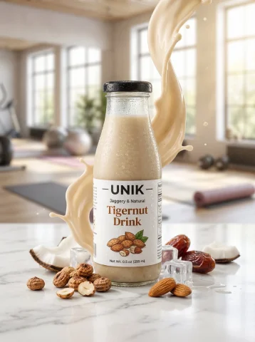 UNIK Tigernut Natural Drink Fitness Scene Product Advertisement — Nano Banana 2 AI Prompt: Ultra-realistic lifestyle beverage advertisement featuring a chilled bottle of "...