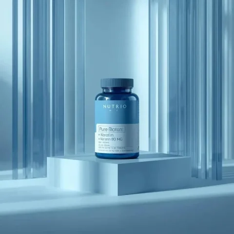 Blue Minimalist Supplement Product Photography — Nano Banana 2 AI Prompt: Ultra-realistic minimalist product photography featuring a cylindrical supplemen...