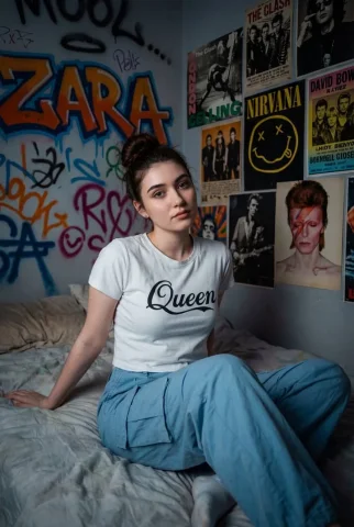 Grunge Bedroom Portrait — Nano Banana 2 AI Prompt: A high-quality, cinematic medium close portrait of a person sitting on a messy b...