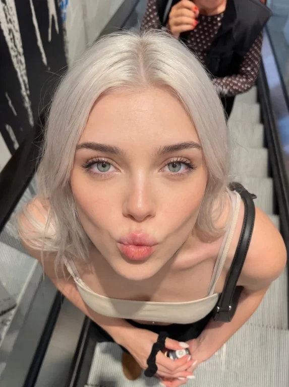Platinum Hair Duck Face Escalator Selfie