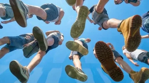 Skywalk — Nano Banana 2 AI Prompt: View from under a plane of completely transparent plexiglass. We are looking str...