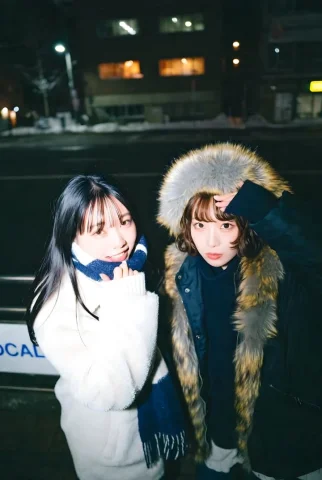 Abstract Portrait Entity — Nano Banana 2 AI Prompt: Close-up photograph of 【two cute K-pop idol Japanese women】 in 【Y2K winter na...