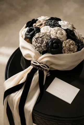 Brand Love Dialogue — Nano Banana 2 AI Prompt: A romantic square-format bouquet inspired by [Brand Name]. Roses are crafted fro...
