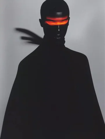 Shadowed Man in Vogue — Midjourney v6 AI Prompt: mysterious man, the man from shadow, Paolo Roversi for a vogue magazine, fashion...