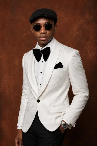 Product Marketing - Confident Formal Studio Portrait — Nano Banana 2 AI Prompt: Create a polished studio fashion portrait of a confident young Black man standin...