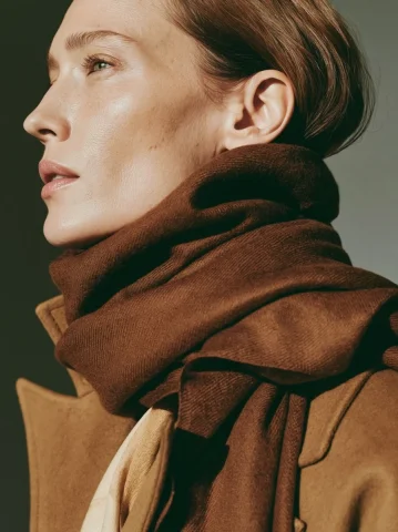 Camel Wool Scarf Editorial — Midjourney v6 AI Prompt: female fashion magazine editorial, intelligent minimalism, elegant European woma...