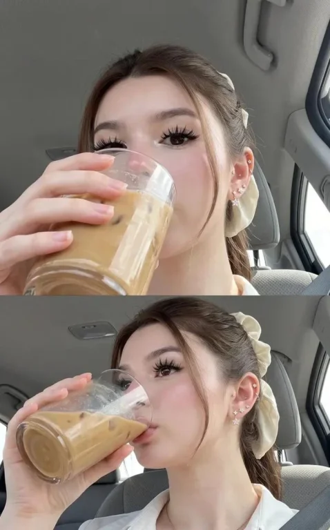 A woman takes a selfie in a car with natural light