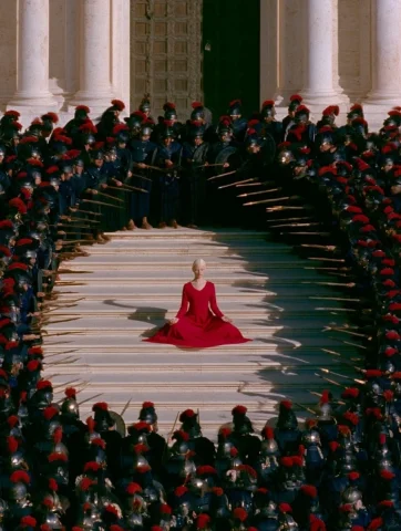 Red Dress Meditation Circled by Soldiers — Midjourney v6 AI Prompt: Surreal cinematic photograph of a young woman in a vivid red dress meditating at...