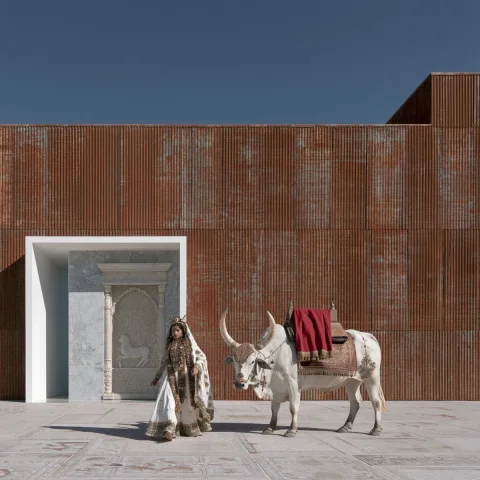 Surreal Indian Queen With White Bull — Midjourney v6 AI Prompt: corogated corossion metal wall front elevation with white door opening and marbl...