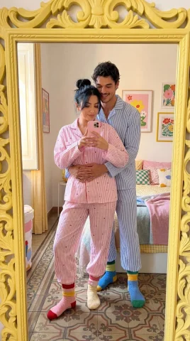 A couple takes a cozy mirror selfie in matching pajamas — Nano Banana 2 AI Prompt: Ultra-photorealistic cozy couple mirror selfie, romantic matching pajama lifesty...